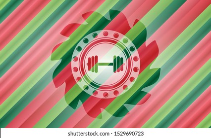dumbbell icon inside christmas emblem.
