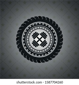 dumbbell icon inside dark badge
