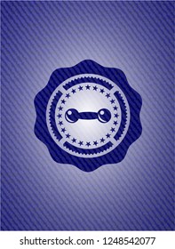 dumbbell icon inside denim background