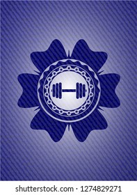 dumbbell icon inside emblem with denim texture