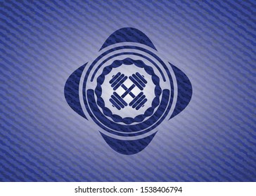 dumbbell icon inside emblem with denim texture