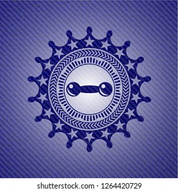 dumbbell icon inside emblem with jean high quality background