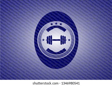 dumbbell icon inside emblem with jean high quality background