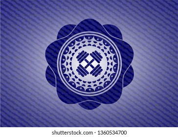 dumbbell icon inside emblem with jean background