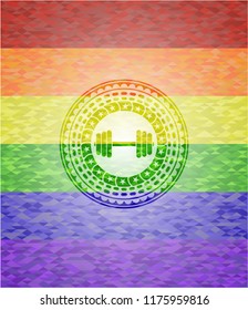 dumbbell icon inside emblem on mosaic background with the colors of the LGBT flag