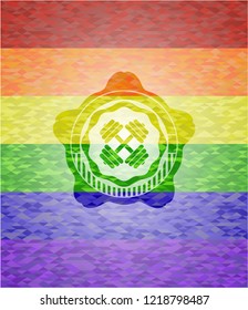 dumbbell icon inside emblem on mosaic background with the colors of the LGBT flag