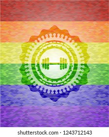 dumbbell icon inside emblem on mosaic background with the colors of the LGBT flag