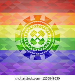 dumbbell icon inside emblem on mosaic background with the colors of the LGBT flag