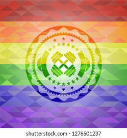 dumbbell icon inside emblem on mosaic background with the colors of the LGBT flag