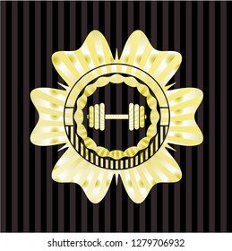 dumbbell icon inside gold badge or emblem