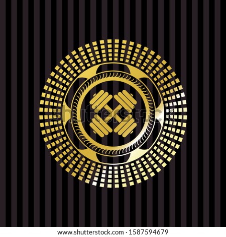 dumbbell icon inside gold shiny badge