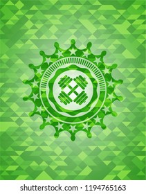 dumbbell icon inside green emblem with mosaic ecological style background