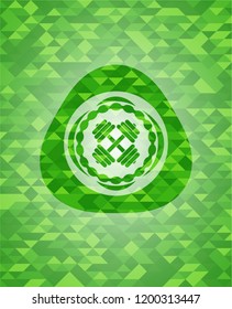 dumbbell icon inside green emblem with mosaic ecological style background