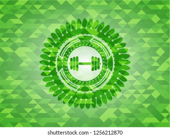 dumbbell icon inside green emblem. Mosaic background