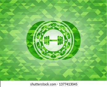 dumbbell icon inside green emblem with triangle mosaic background