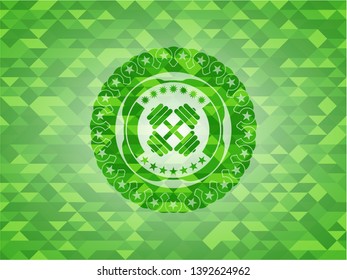 dumbbell icon inside green emblem with triangle mosaic background
