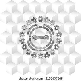 dumbbell icon inside grey badge with geometric cube white background