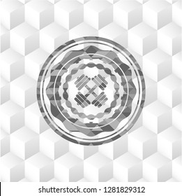 dumbbell icon inside grey badge with geometric cube white background