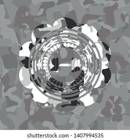 dumbbell icon inside grey camouflage texture