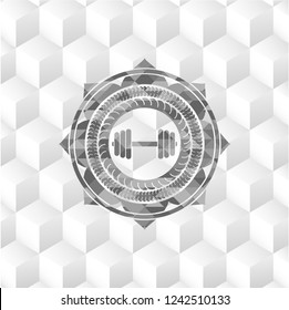 dumbbell icon inside grey emblem with geometric cube white background