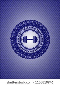 dumbbell icon inside jean background