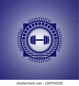 dumbbell icon inside jean background