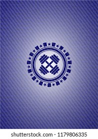 dumbbell icon inside jean or denim emblem or badge background