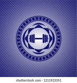 dumbbell icon inside jean or denim emblem or badge background