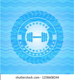 dumbbell icon inside light blue water badge background.