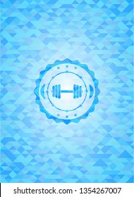dumbbell icon inside light blue emblem with mosaic background