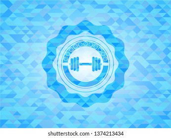dumbbell icon inside light blue emblem with mosaic background