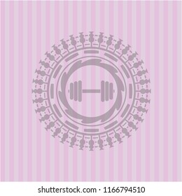 dumbbell icon inside pink emblem