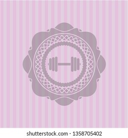 dumbbell icon inside pink emblem