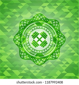 dumbbell icon inside realistic green mosaic emblem