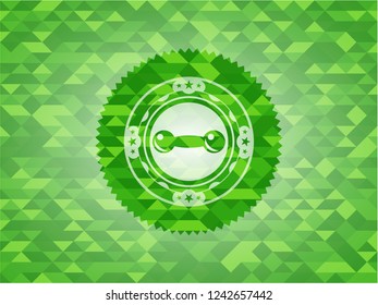 dumbbell icon inside realistic green mosaic emblem