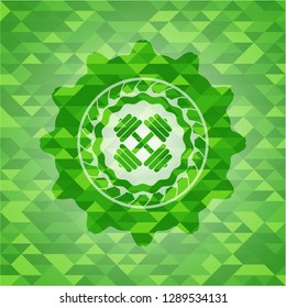 dumbbell icon inside realistic green emblem. Mosaic background