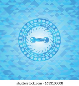 dumbbell icon inside realistic light blue mosaic emblem
