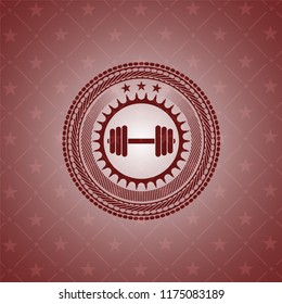 dumbbell icon inside red emblem