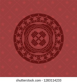 dumbbell icon inside red icon or emblem