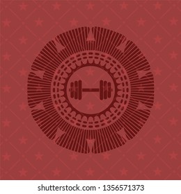 dumbbell icon inside red emblem