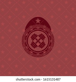 dumbbell icon inside red emblem