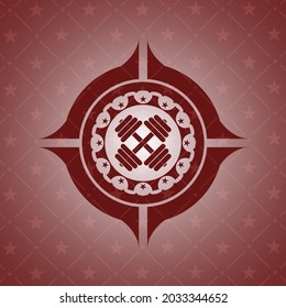 dumbbell icon inside red emblem. 