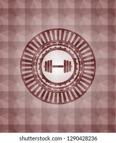 dumbbell icon inside red seamless geometric badge.