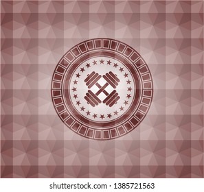 dumbbell icon inside red seamless emblem or badge with abstract geometric pattern background.