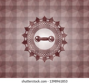 dumbbell icon inside red seamless emblem or badge with geometric pattern background.