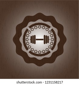 dumbbell icon inside retro style wooden emblem