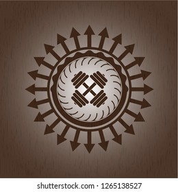 dumbbell icon inside retro wood emblem