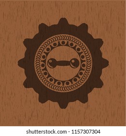 dumbbell icon inside retro wooden emblem