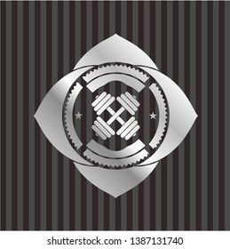 dumbbell icon inside silver badge or emblem