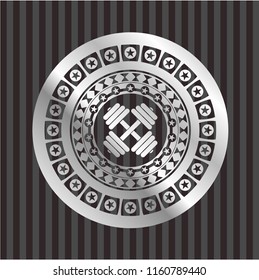 dumbbell icon inside silver emblem
